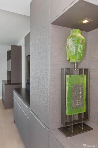 a bathroom with a shower and a sink