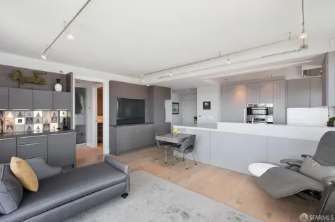 a living room with furniture and view of living room