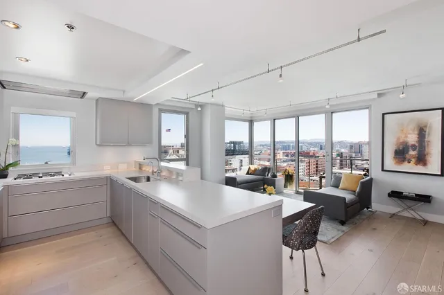 a view of living room with furniture and floor to ceiling window