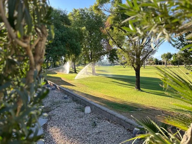 a view of a yard with an outdoor space