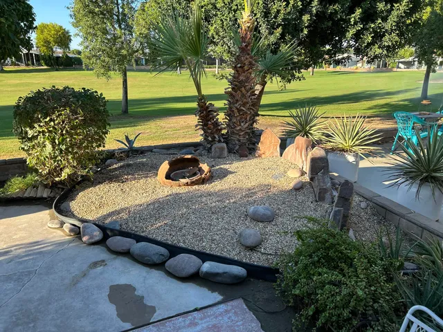 an outdoor space with furniture