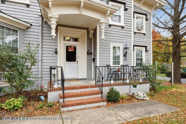 27 Spring Street Freehold, NJ 07728 - Photo 2 of 40 a front view of a house with a garden