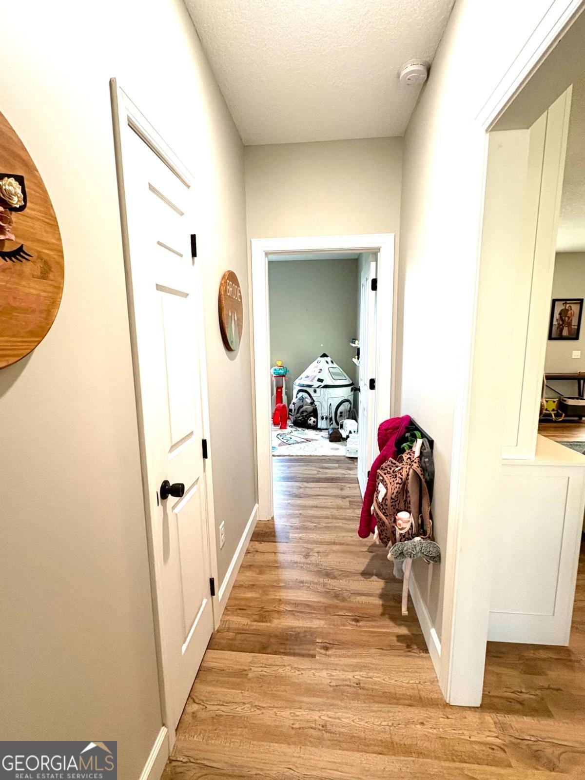 134 Austin Way Vidalia, GA 30474 - Photo 23 of 41 a view of a room with wooden floor and furniture