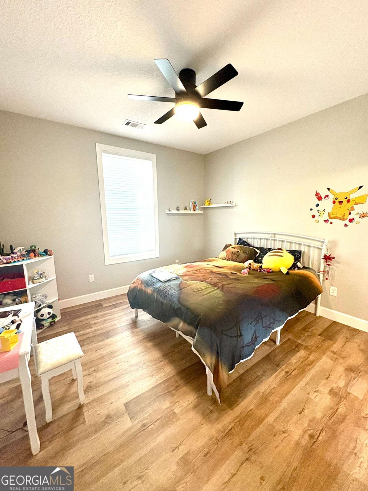 134 Austin Way Vidalia, GA 30474 - Photo 24 of 41 a bedroom with a bed and window