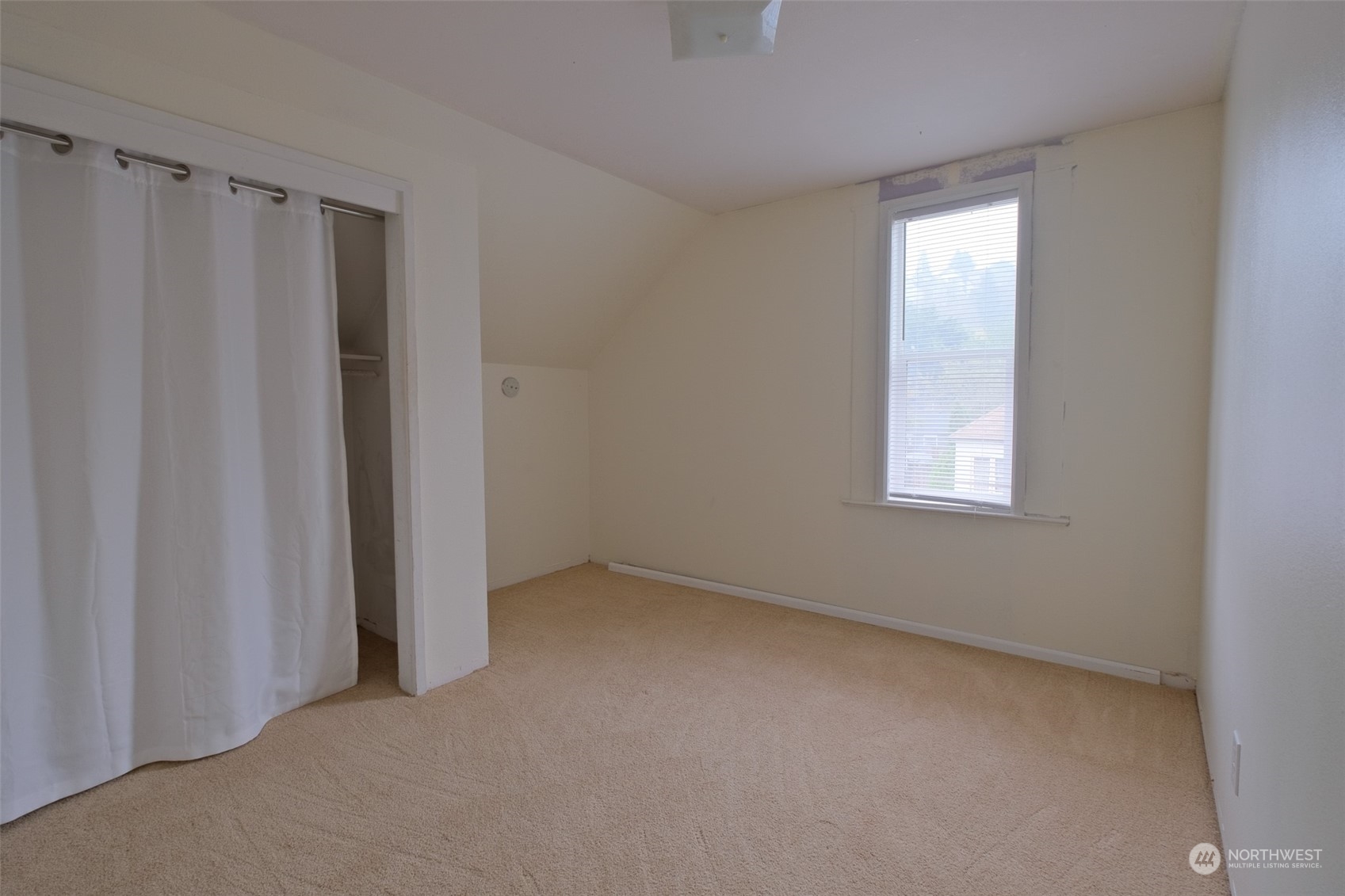 525 Wells Avenue South Renton, WA 98057 - Photo 14 of 25 a view of an empty room with a window
