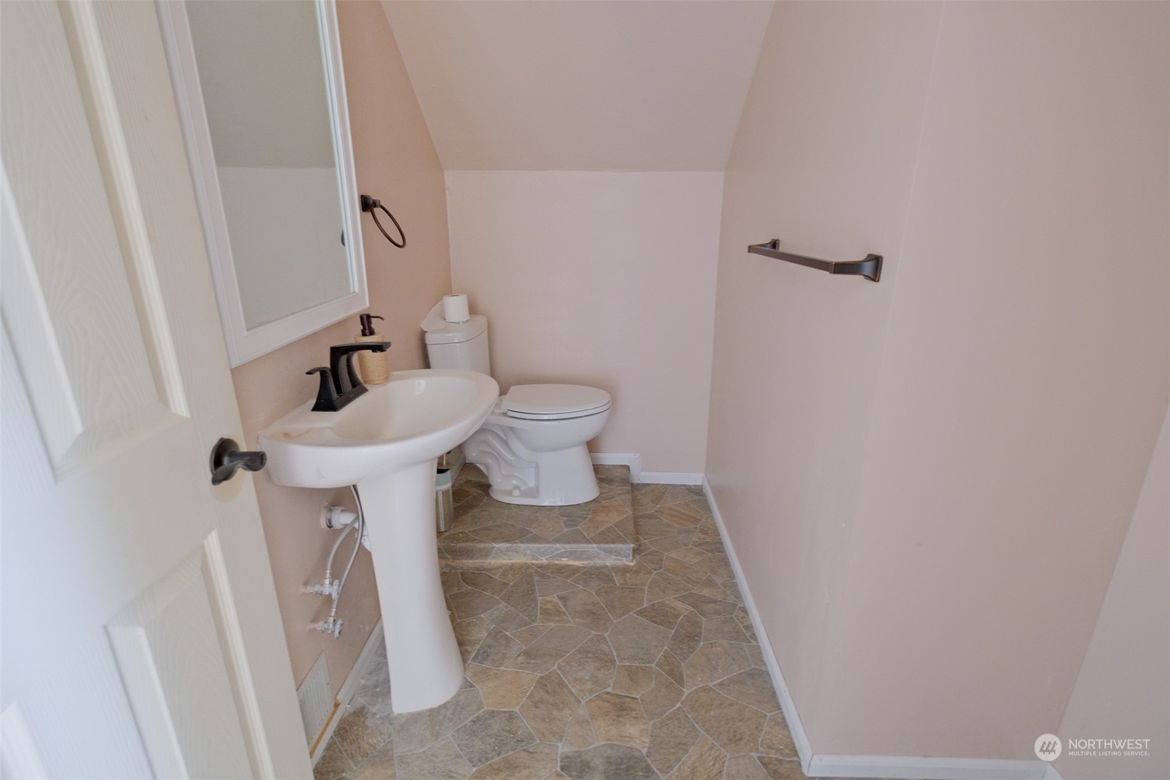 525 Wells Avenue South Renton, WA 98057 - Photo 15 of 25 a bathroom with a sink toilet and shower