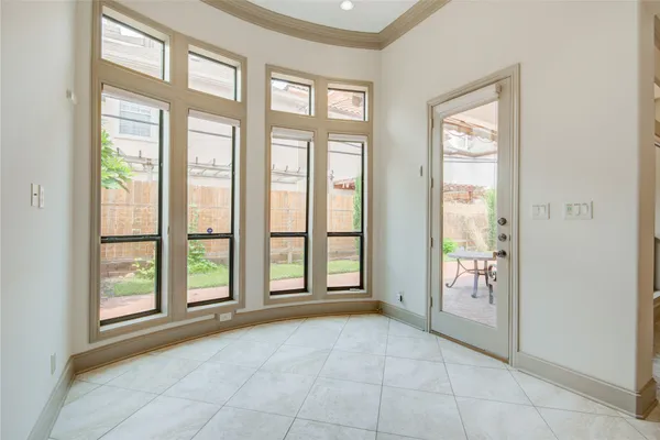 a large bathroom with a granite countertop double vanity sink a mirror and a shower