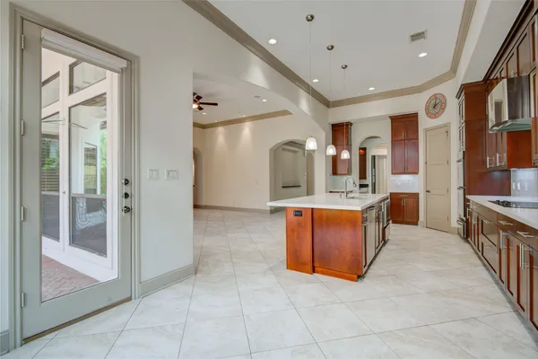 a large bathroom with a large tub and sink