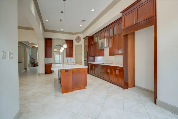 a view of a livingroom with a fireplace and cabinet