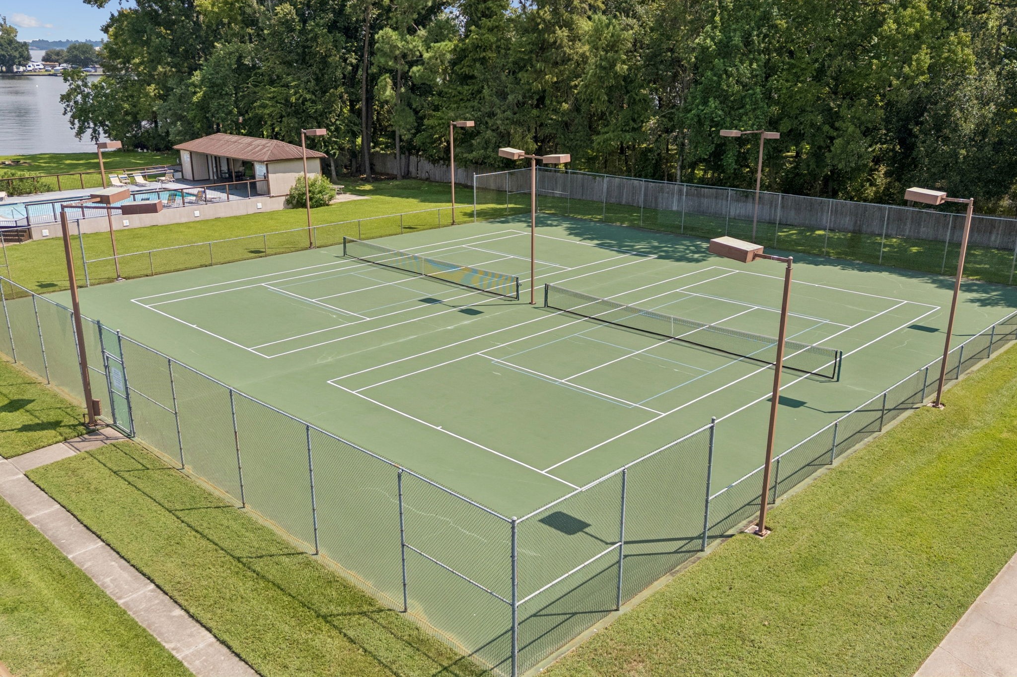500 River Road, Unit 106 Montgomery, TX 77356 - Photo 29 of 32 Two tennis/pickleball courts.