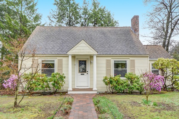 4 Abbott Road Natick, MA 01760 - Photo 1 of 30 a front view of a house with garden
