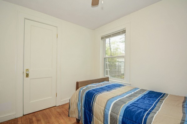 4 Abbott Road Natick, MA 01760 - Photo 17 of 30 a bedroom with a bed and a window