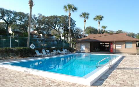 2745 Forest Ridge Drive, Unit 2745 Fernandina Beach, FL 32034 - Photo 5 of 5 a view of a house with swimming pool