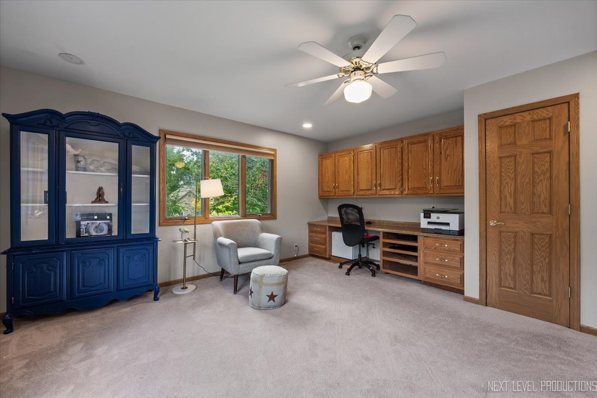 905 Merrill New Road Sugar Grove, IL 60554 - Photo 26 of 44 a living room with furniture and a window