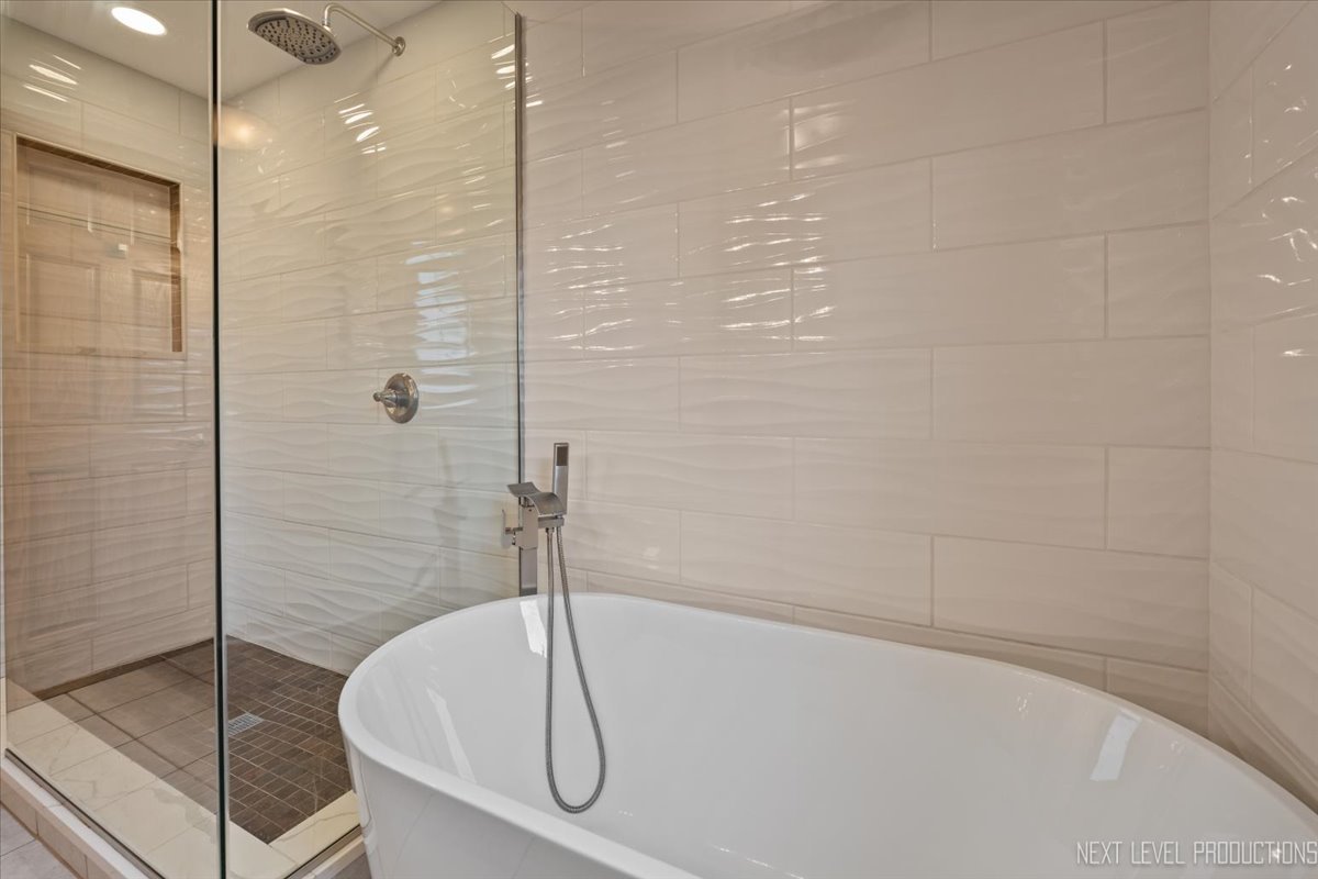 905 Merrill New Road Sugar Grove, IL 60554 - Photo 28 of 44 a bathroom with a shower