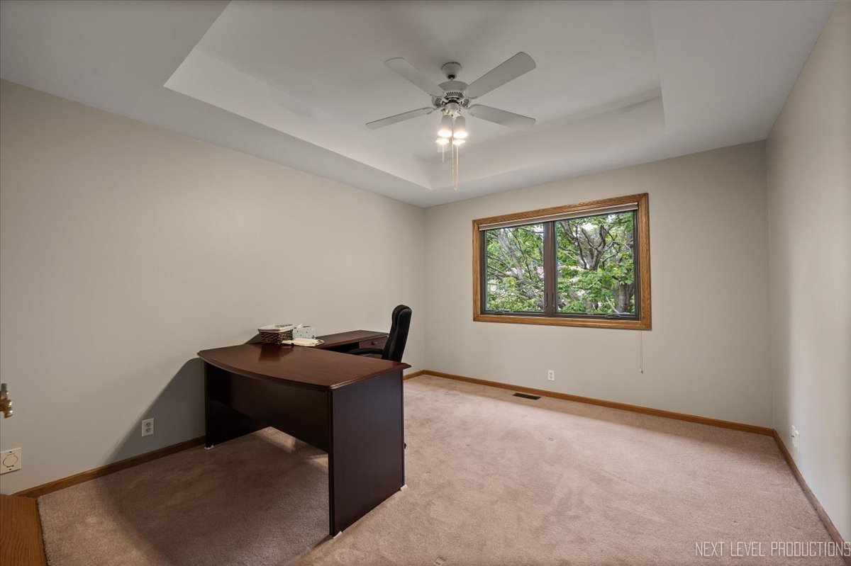 905 Merrill New Road Sugar Grove, IL 60554 - Photo 31 of 44 a workspace with furniture and window