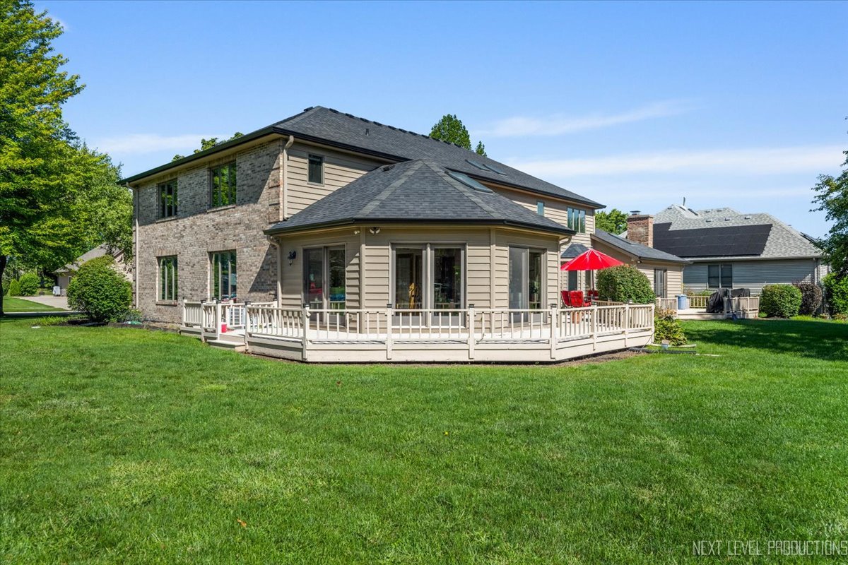 905 Merrill New Road Sugar Grove, IL 60554 - Photo 43 of 44 a view of a house with a yard porch and sitting area