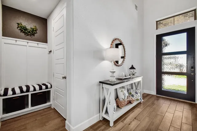 a view of a hallway with workspace