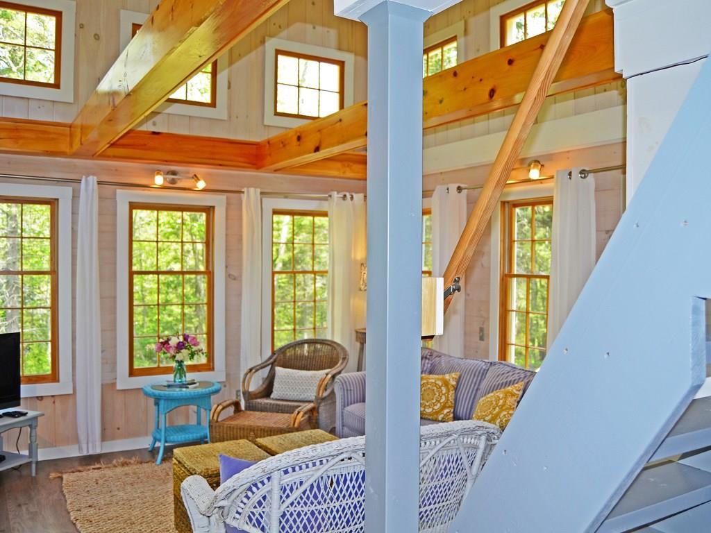 47 Shore Acres Road Bar Harbor, ME 04609 - Photo 8 of 21 Stairs lead to the loft area, which...