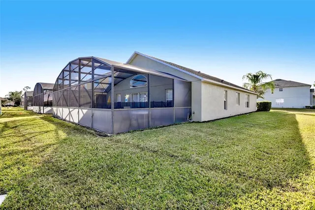 a view of a back yard of the house