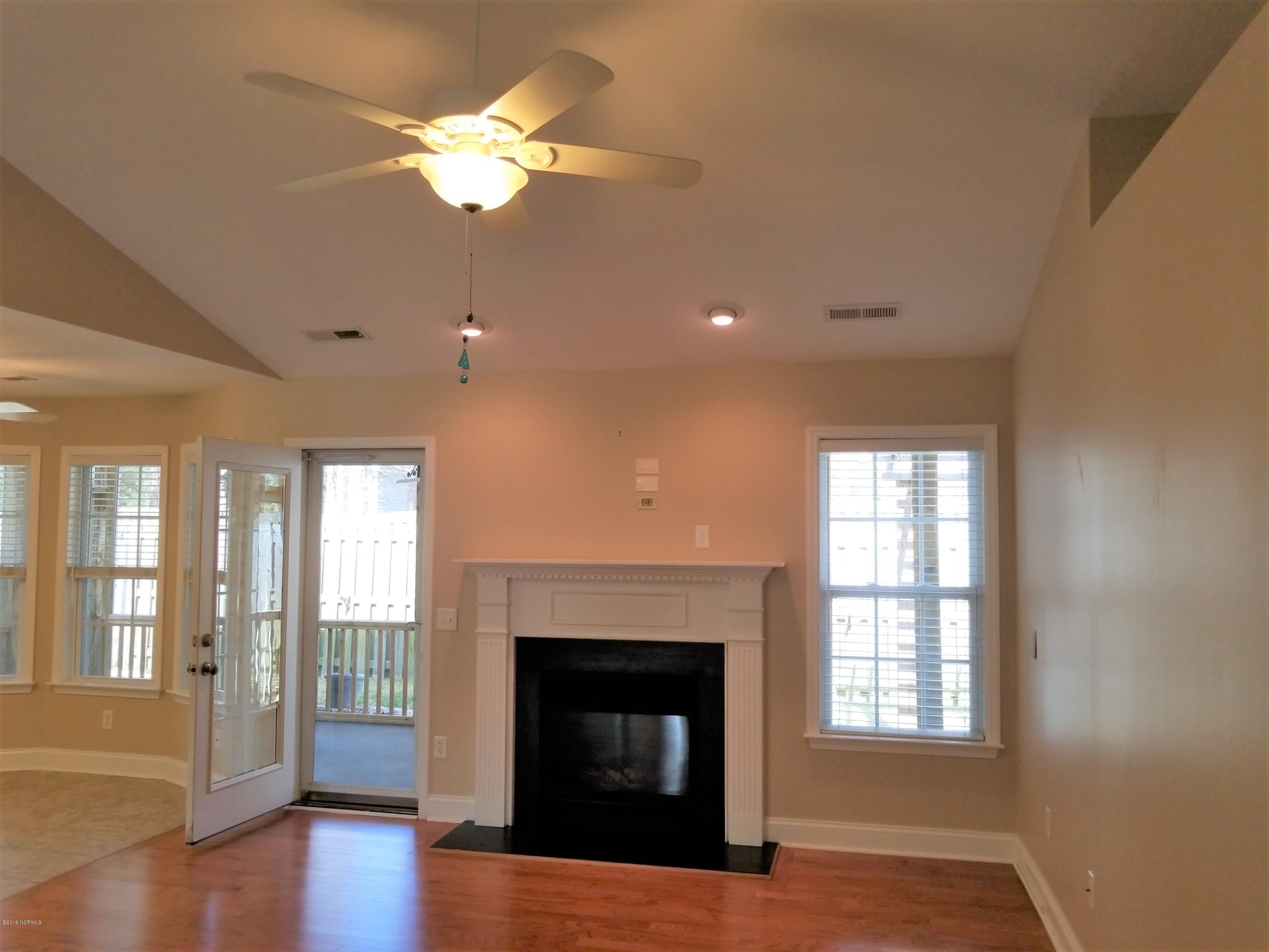 4388 Frying Pan Road Southeast Southport, NC 28461 - Photo 12 of 38 Spacious Living Room With Fireplace
