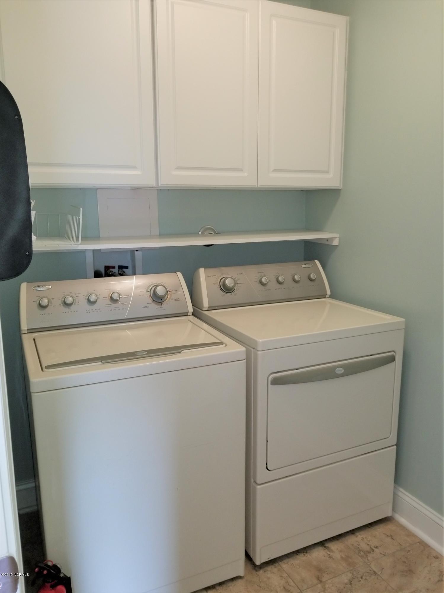 4388 Frying Pan Road Southeast Southport, NC 28461 - Photo 21 of 38 Laundry Room With Storage