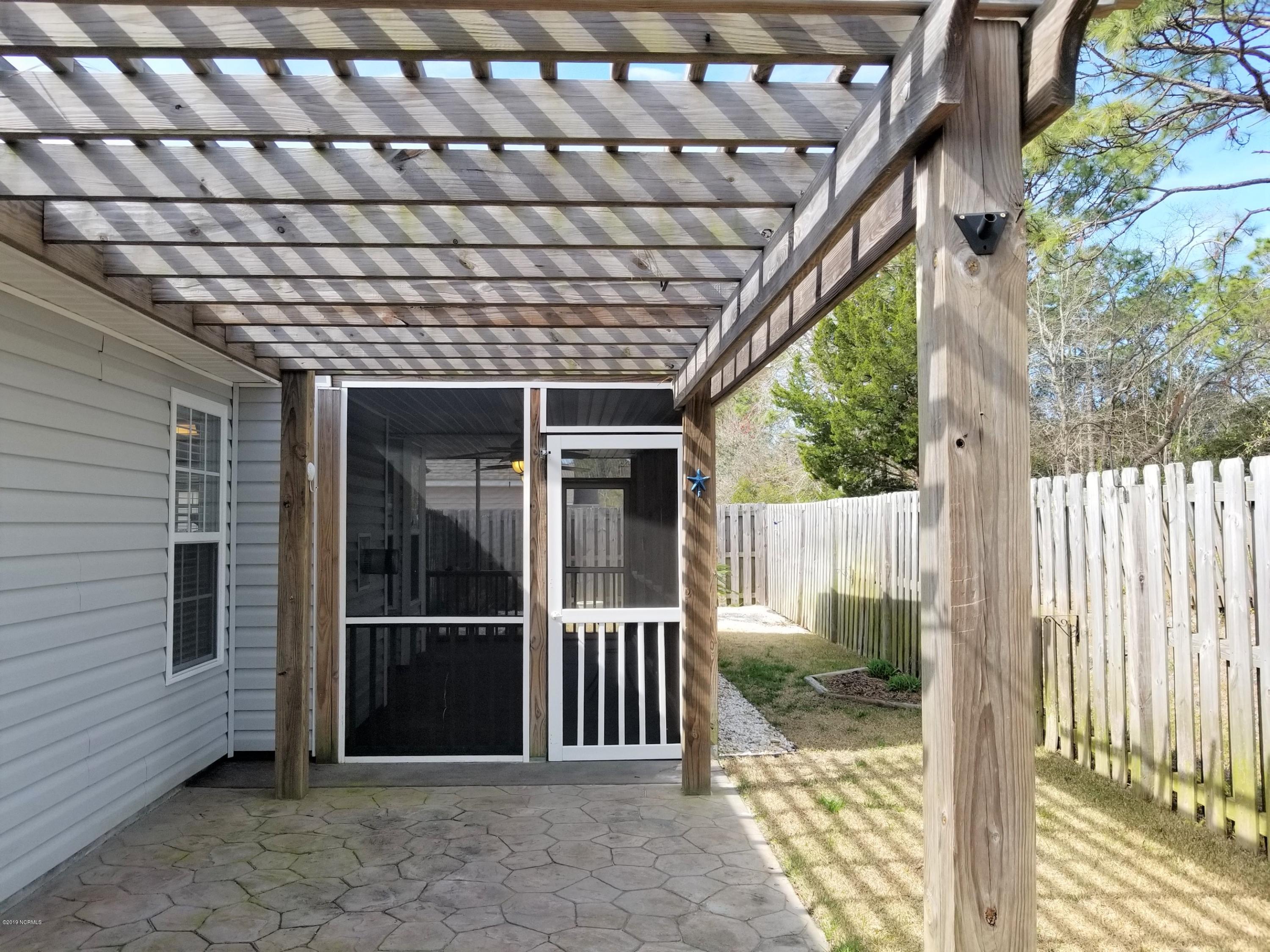 4388 Frying Pan Road Southeast Southport, NC 28461 - Photo 26 of 38 Spacious Patio With Pergola