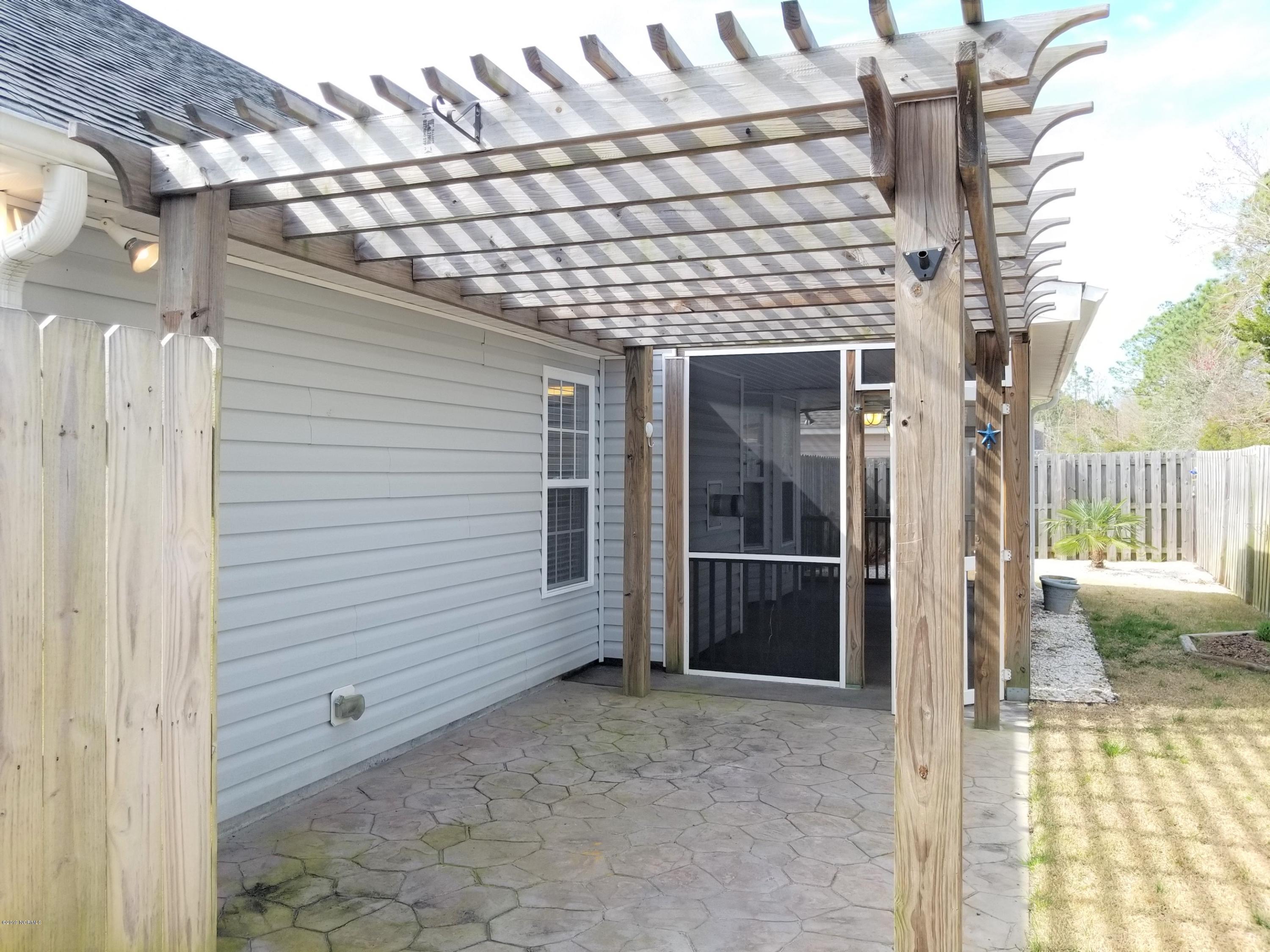 4388 Frying Pan Road Southeast Southport, NC 28461 - Photo 27 of 38 Stamped Concrete Patio