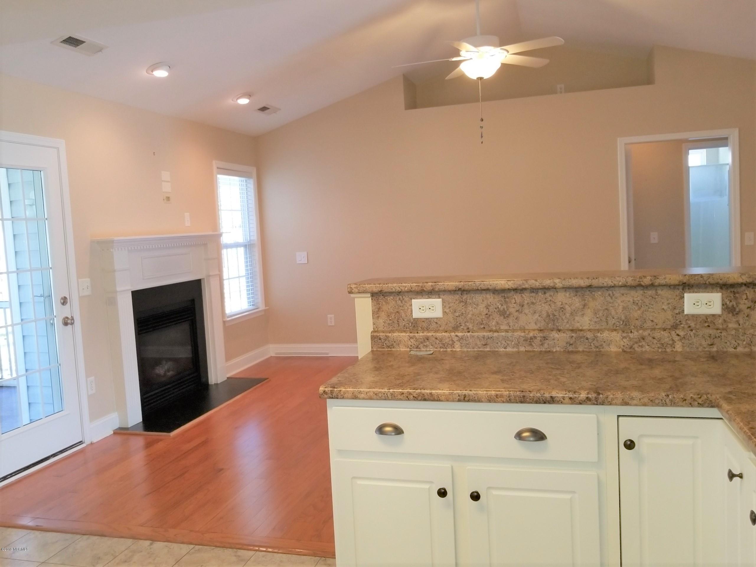 4388 Frying Pan Road Southeast Southport, NC 28461 - Photo 7 of 38 Kitchen is Open to Living Area