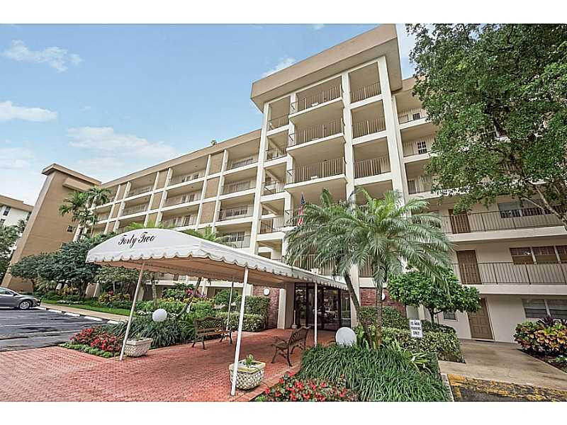 3150 North Course Lane, Unit 206 Pompano Beach, FL 33069 - Photo 1 of 23 Exterior Front.