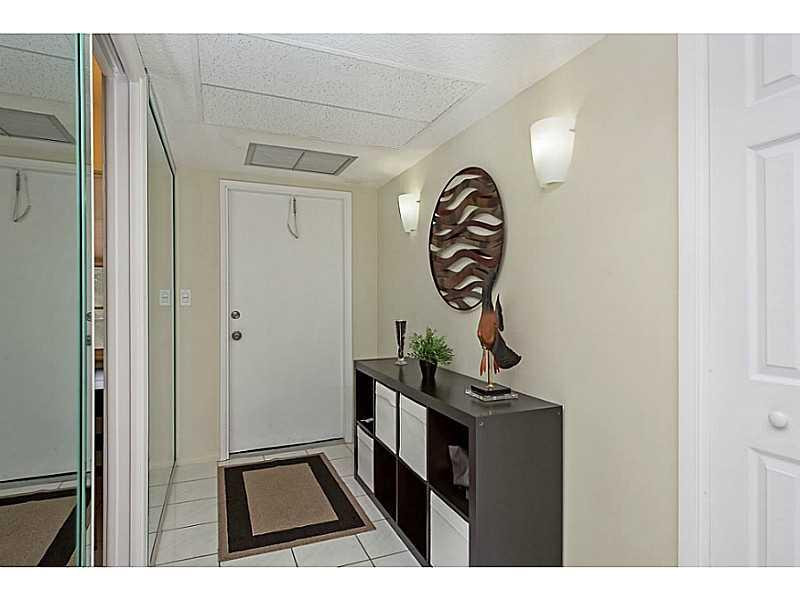 3150 North Course Lane, Unit 206 Pompano Beach, FL 33069 - Photo 4 of 23 Exterior Front.
