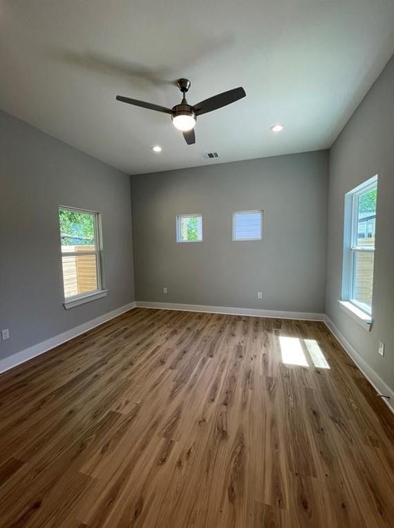 6014 Fairway Street, Unit 2 Austin, TX 78741 - Photo 5 of 20 Unfurnished room with wood finished floors, recessed lighting, and a ceiling fan