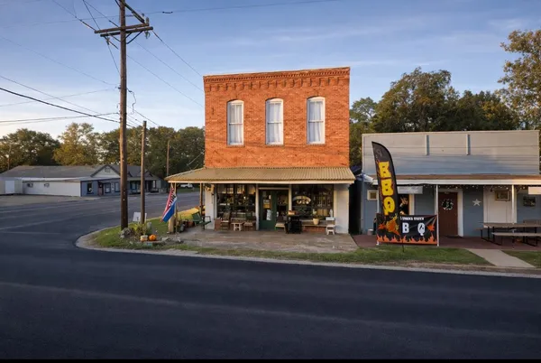a view of a house with a street