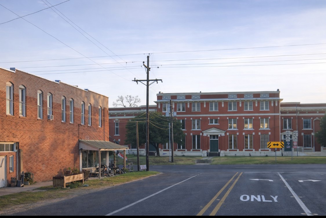 100 East Second Street Groveton, TX 75845 - Photo 5 of 9 a view of a building with a street