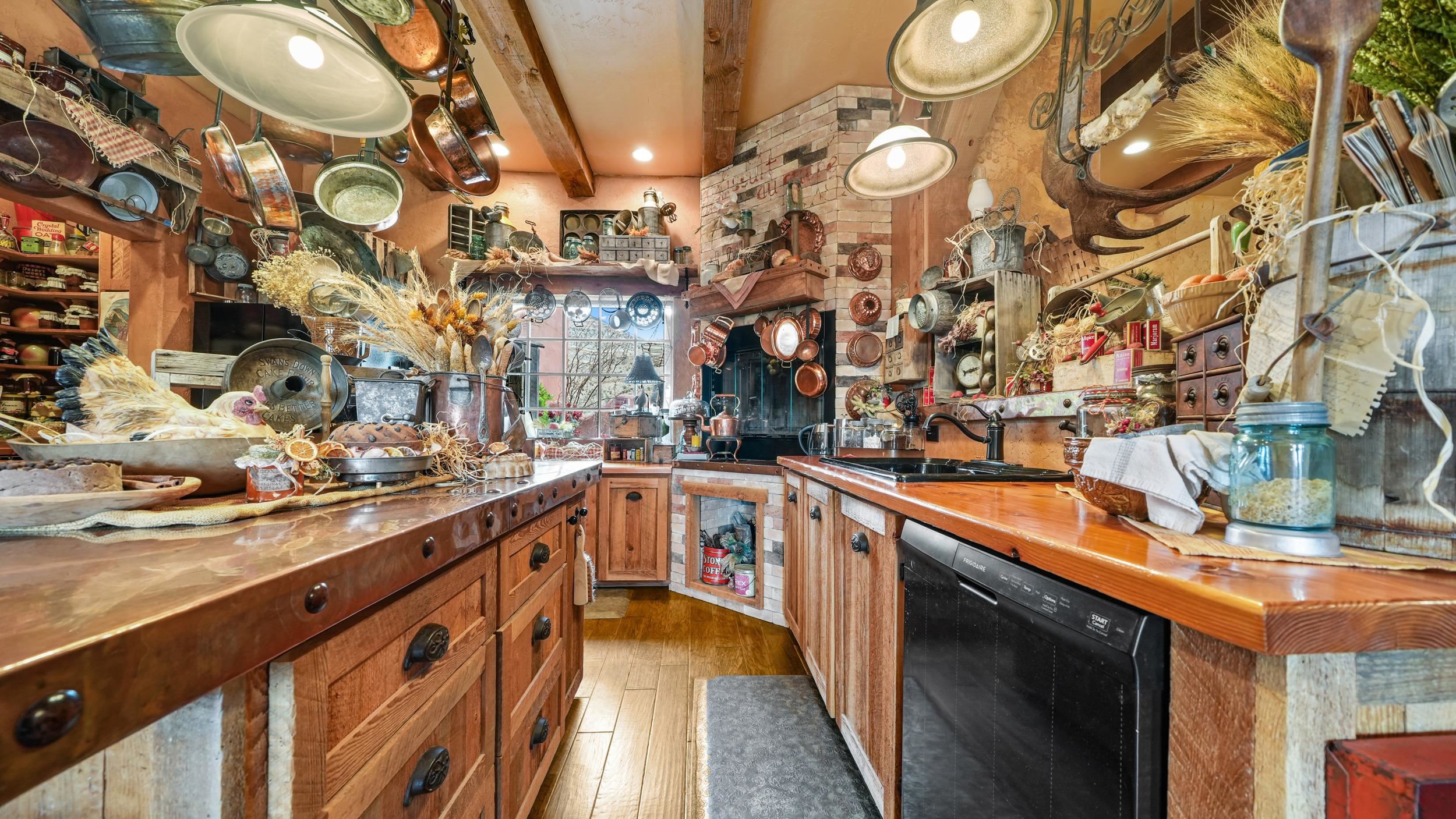 3989 Rapid Creek Road Palisade, CO 81526 - Photo 13 of 39 a kitchen with stainless steel appliances granite countertop a sink and cabinets
