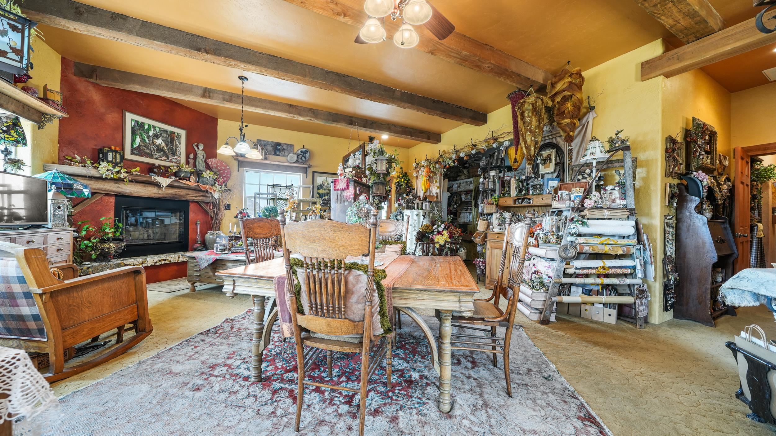 3989 Rapid Creek Road Palisade, CO 81526 - Photo 18 of 39 a view of a big room with furniture and a flat screen tv