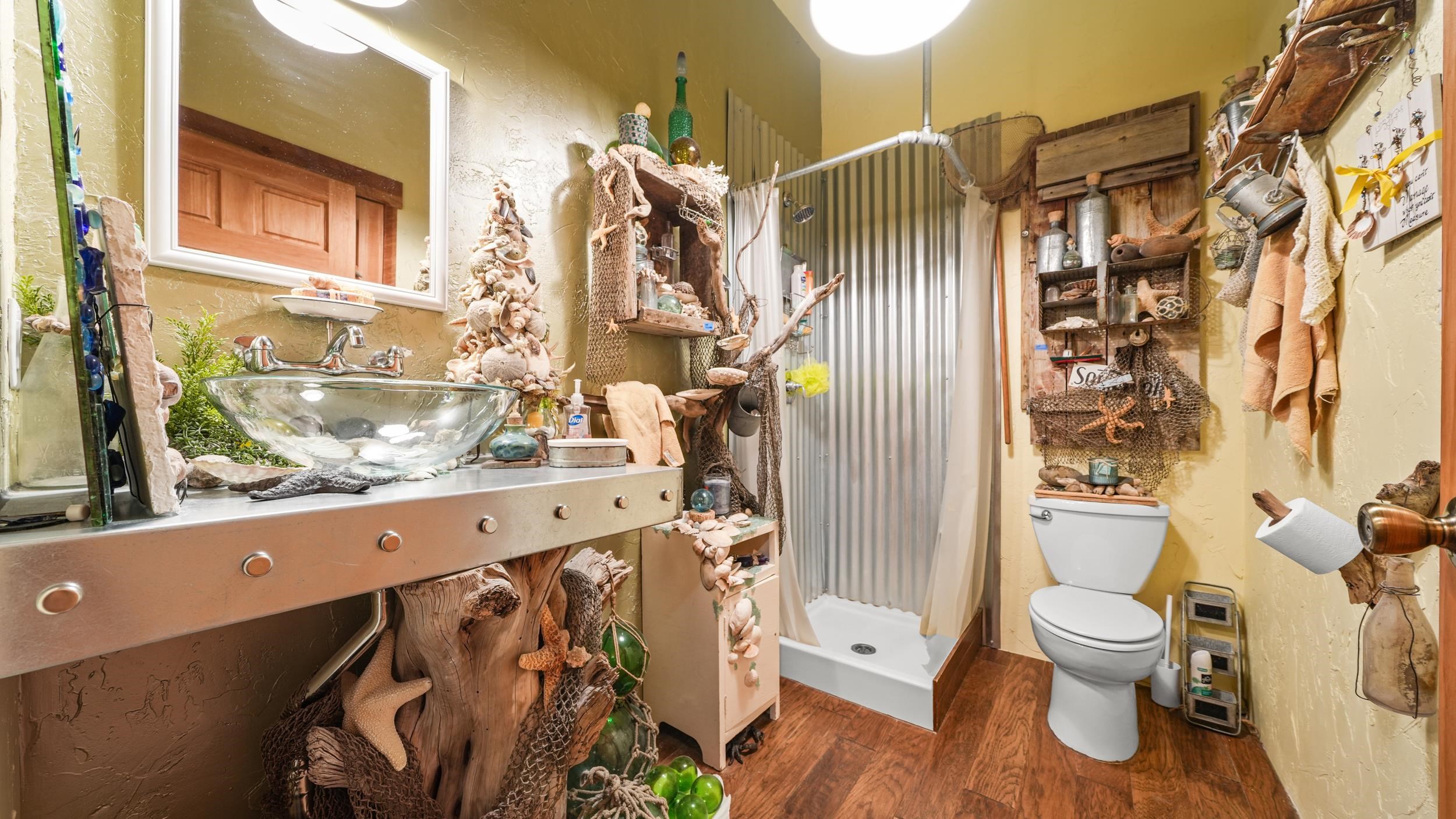 3989 Rapid Creek Road Palisade, CO 81526 - Photo 23 of 39 a bathroom with a toilet and a shower