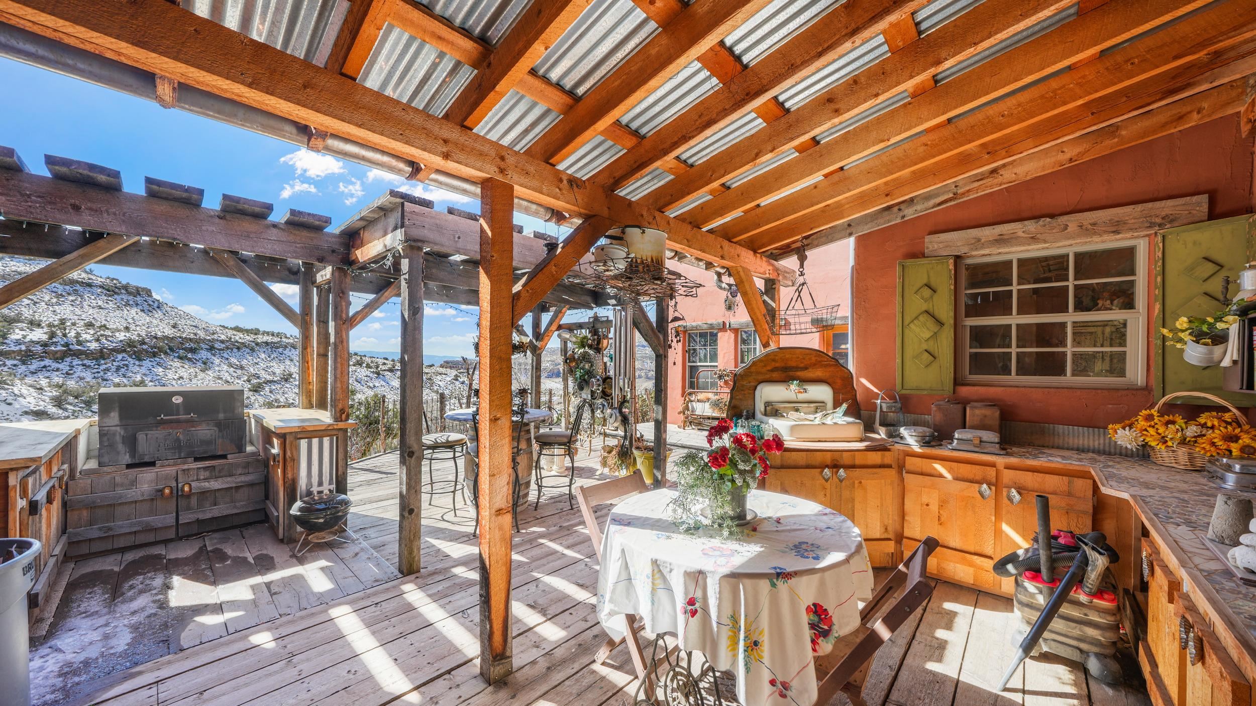 3989 Rapid Creek Road Palisade, CO 81526 - Photo 28 of 39 a view of yard from deck with patio