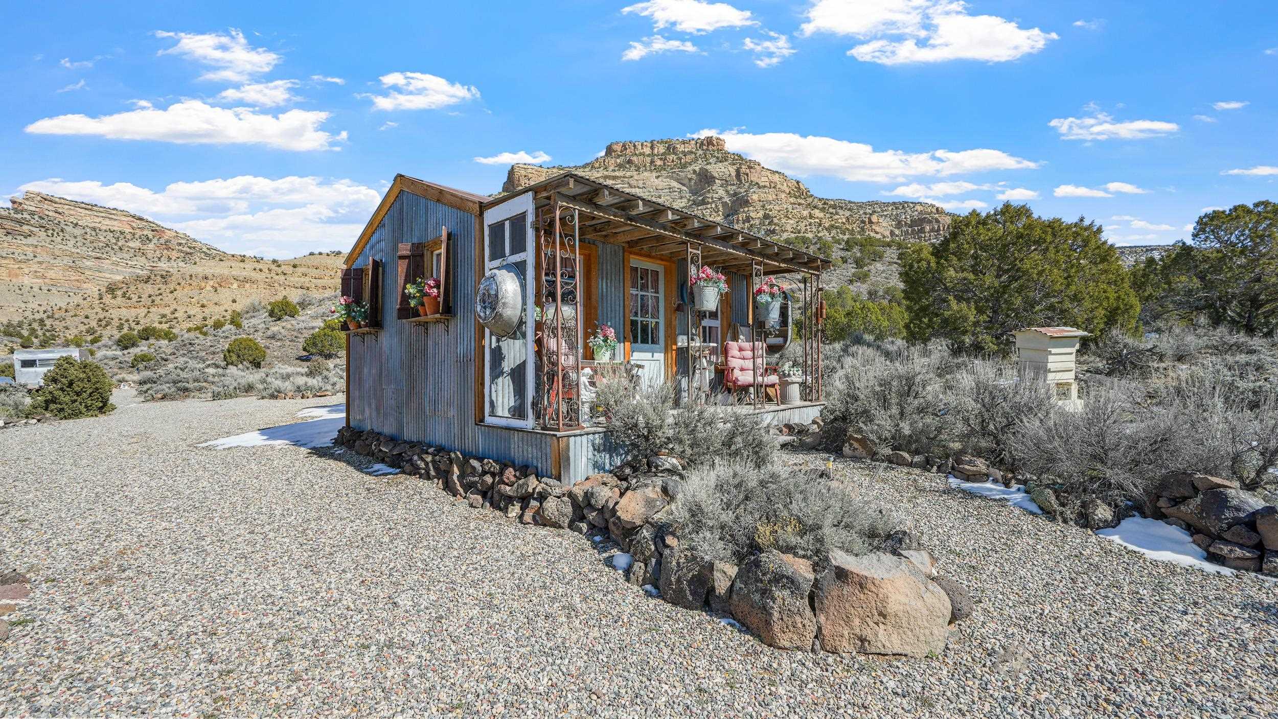 3989 Rapid Creek Road Palisade, CO 81526 - Photo 30 of 39 a view of a house with a yard