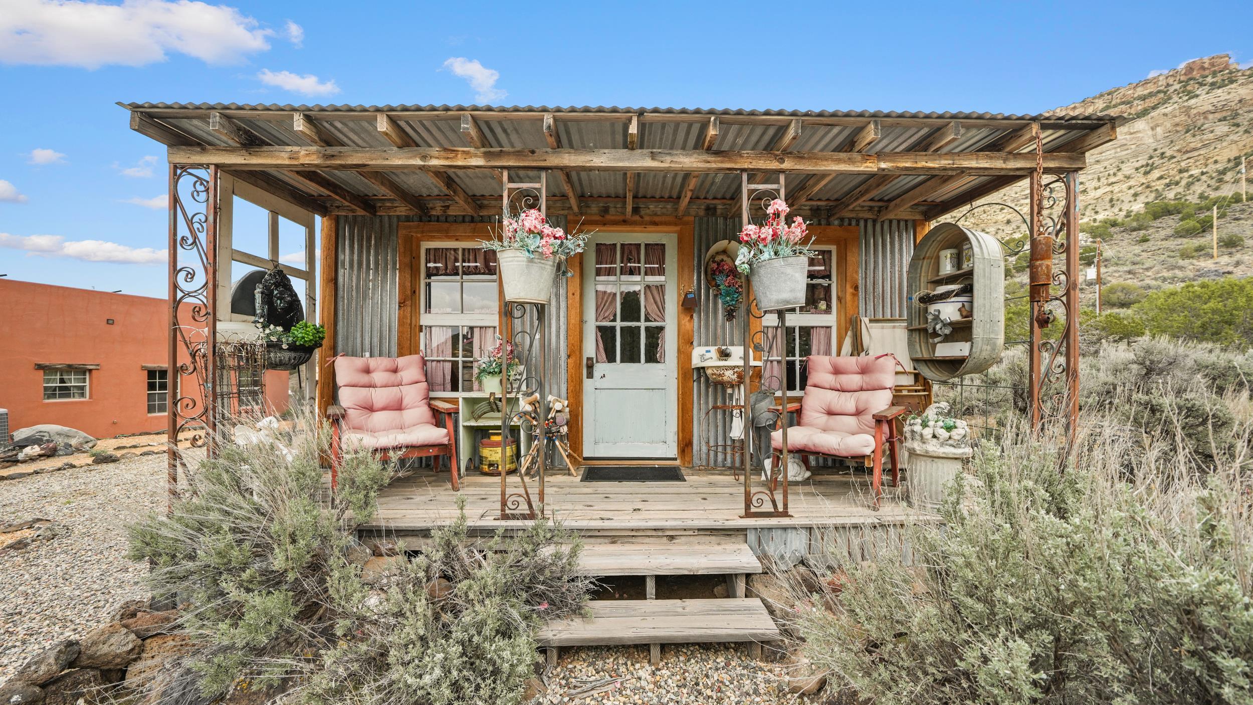 3989 Rapid Creek Road Palisade, CO 81526 - Photo 31 of 39 a view of a chairs and tables in the patio