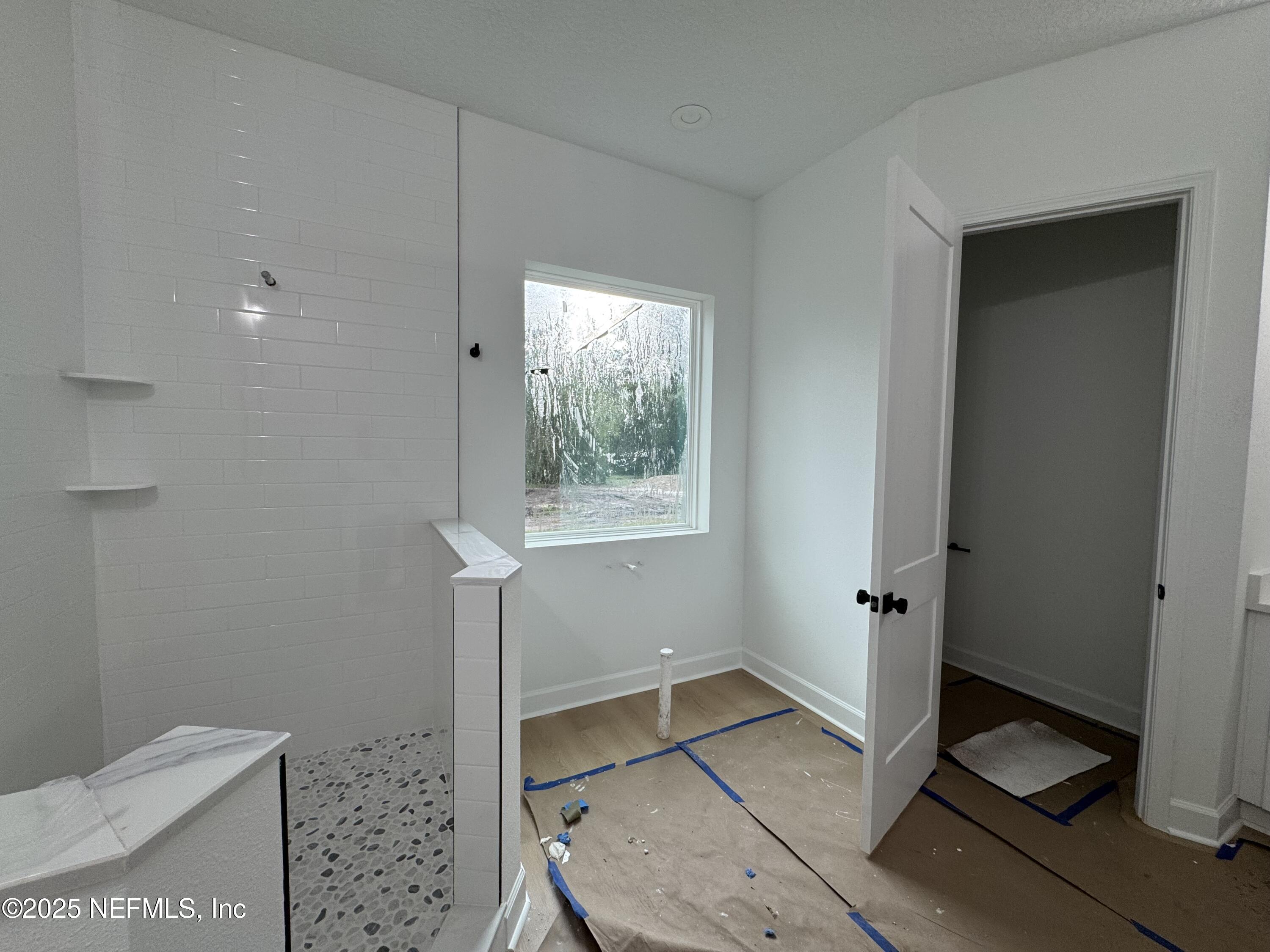 14167 Saddle Ridge Road Macclenny, FL 32063 - Photo 11 of 20 a bathroom with a sink and a shower