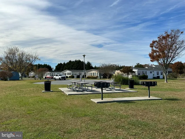 a view of a park with swings