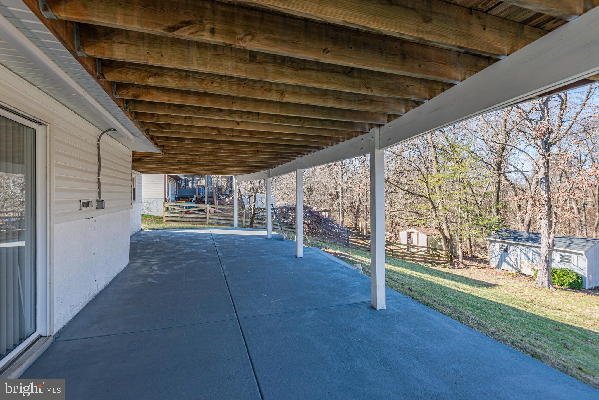 12 Yew Road Baltimore, MD 21221 - Photo 41 of 42 Rear concrete patio beneath deck