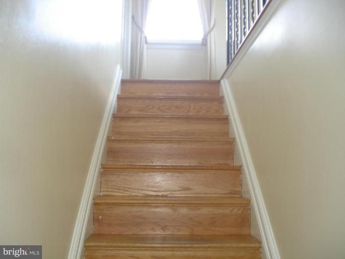 4805 Rollingtop Road Ellicott City, MD 21043 - Photo 17 of 30 leading up to living room
