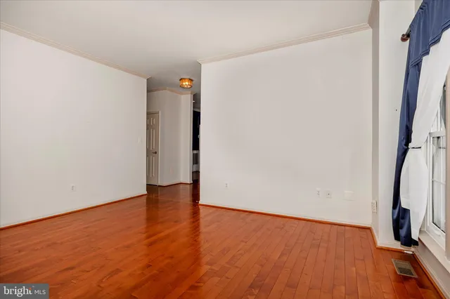 a kitchen with stainless steel appliances granite countertop a refrigerator a sink a stove a microwave and island