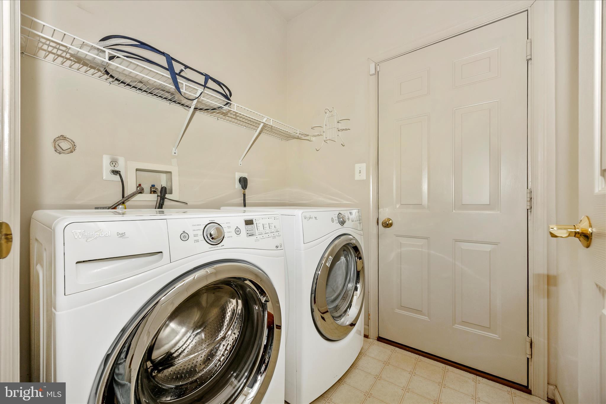 828 Geronimo Drive Frederick, MD 21701 - Photo 41 of 64 a utility room with dryer and washer