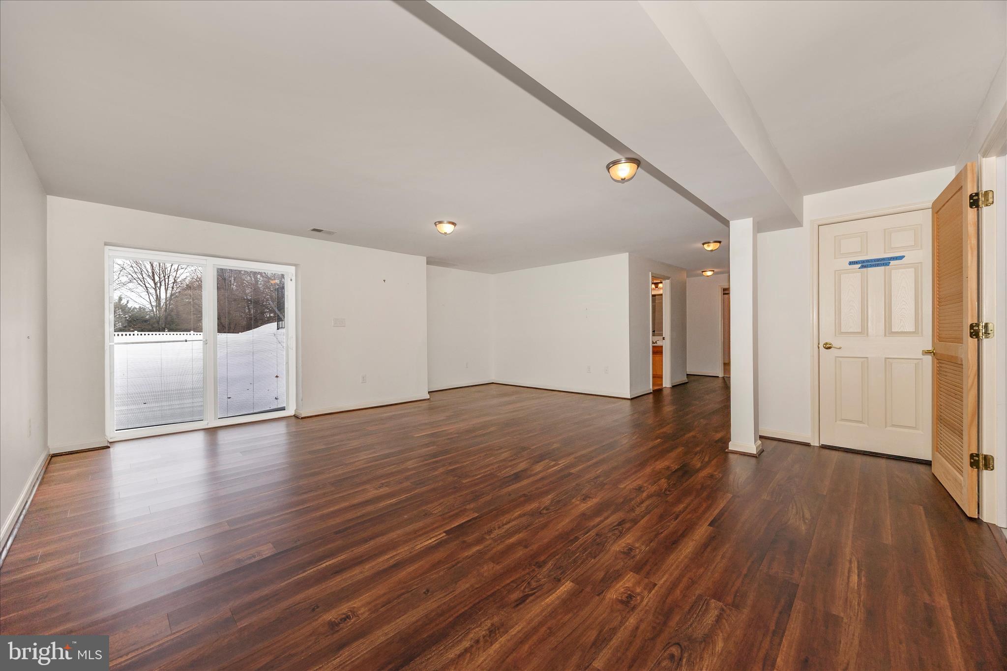 828 Geronimo Drive Frederick, MD 21701 - Photo 43 of 64 a view of empty room with wooden floor