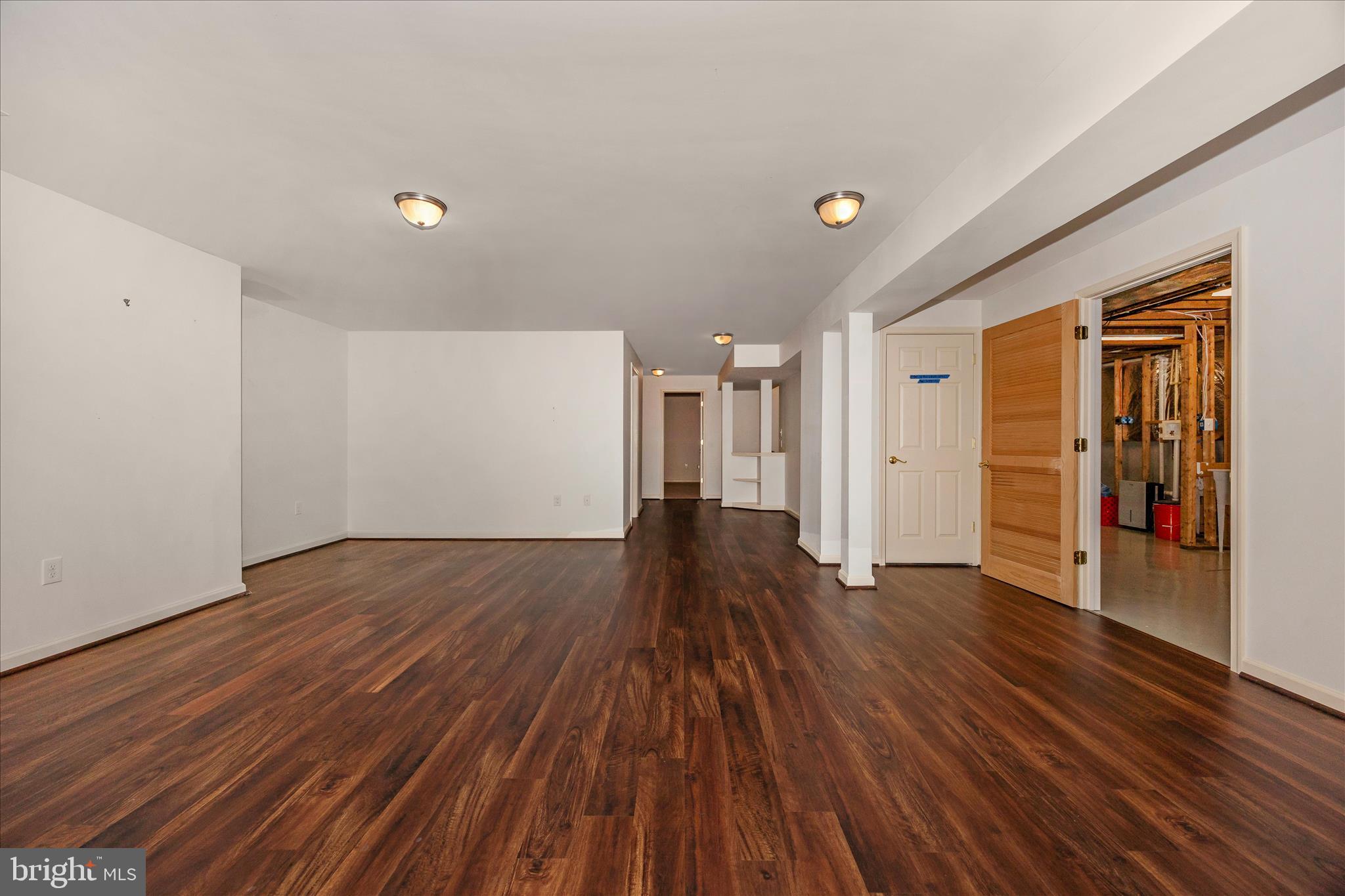 828 Geronimo Drive Frederick, MD 21701 - Photo 44 of 64 a view of empty room with wooden floor