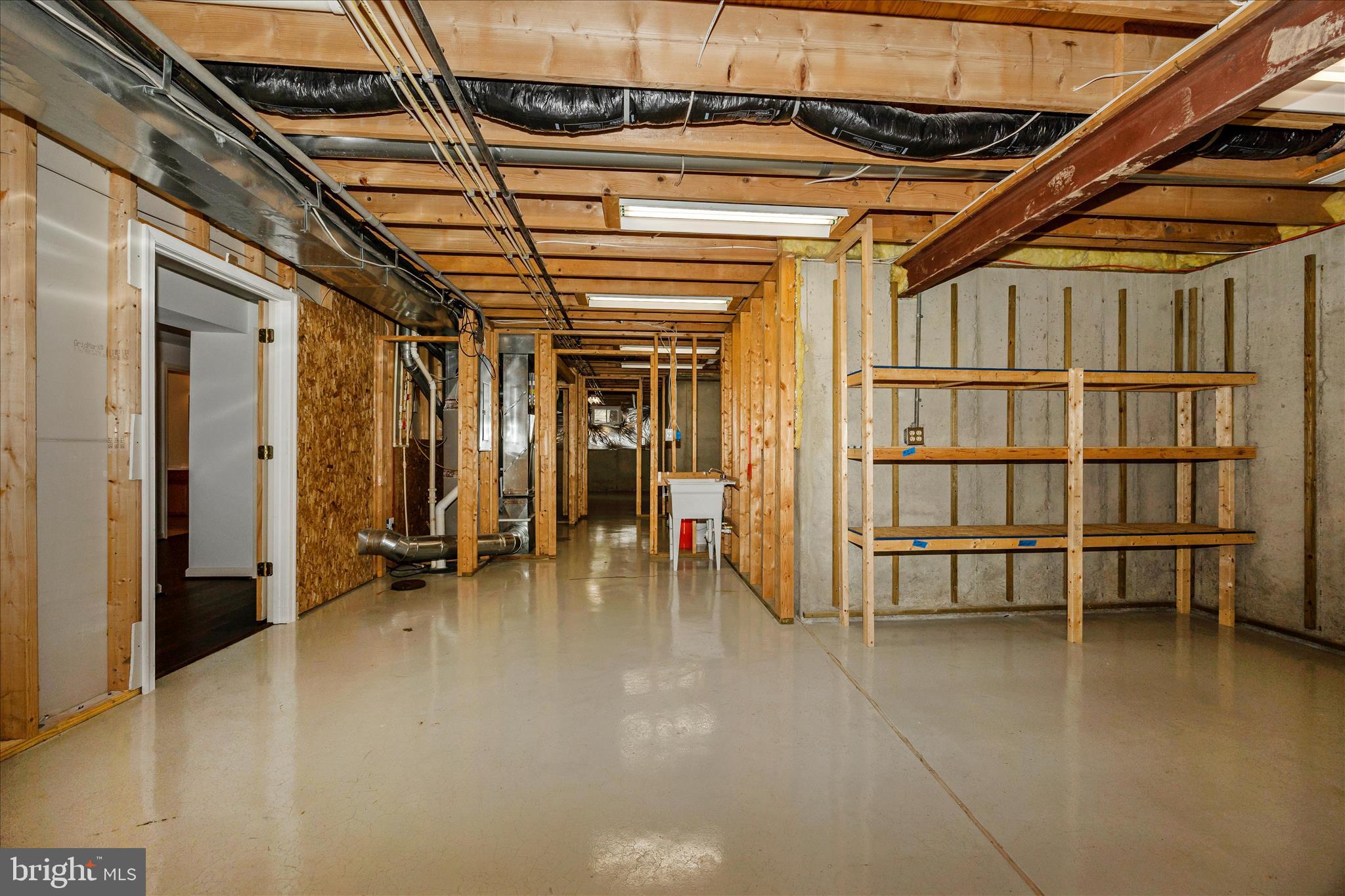 828 Geronimo Drive Frederick, MD 21701 - Photo 45 of 64 a view of empty room with wooden floor