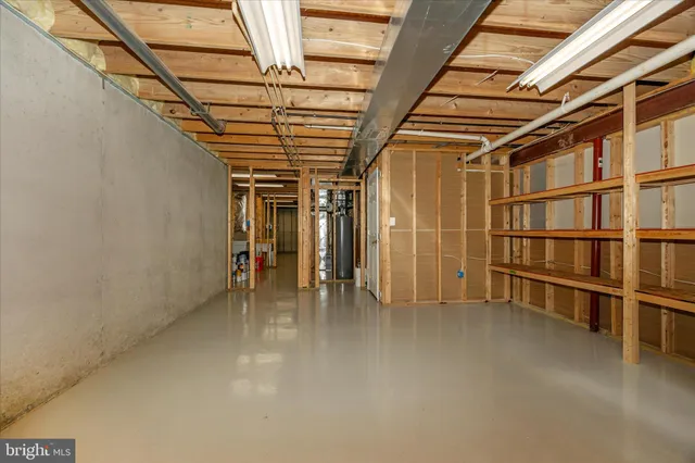 a view of a house with a snow in the yard